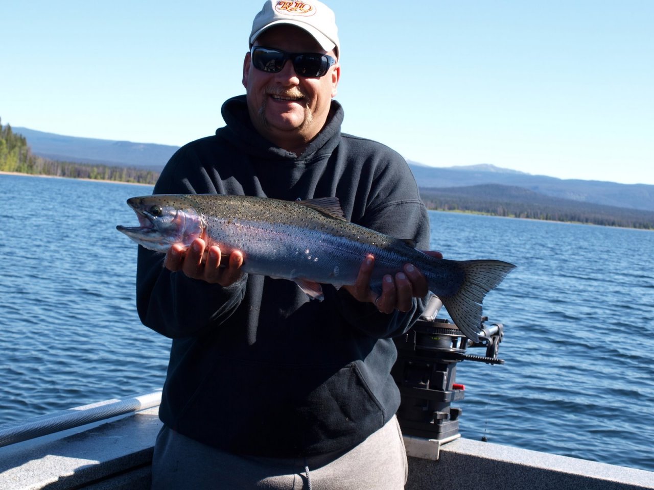 Author  with a Eutsuk Lake Rainbow (4lbs)
